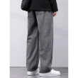 Back view of men's grey loose fit jeans