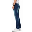 Side profile of men's blue skinny fit denim jeans