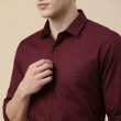 Close-up collar detail of maroon casual shirt for men