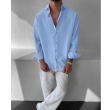 light blue self design shirt with white trousers