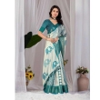 Traditional styling of off-white and teal printed lichi silk saree