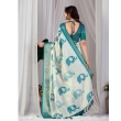 Full length view of women's off-white and teal printed lichi silk saree
