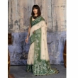 Traditional cream and green Munga cotton saree with elegant woven border design