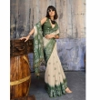 Ethnic cream and green Munga cotton saree suitable for festive occasions