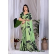 Woman Wearing Pista Green and Black Abstract Printed Satin Georgette Saree