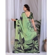 Close-Up Blouse and Print Design of Pista Green Satin Georgette Saree