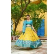 Elegant yellow teal lehenga with matching dupatta