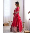 Red embroidered lehenga choli with sequence work dupatta side pose