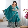 Traditional teal green lehenga choli paired with matching embroidered dupatta