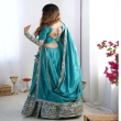 Back view of teal green embroidered lehenga choli for festive occasions