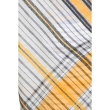 Close up of off white and yellow pure cotton saree fabric showing abstract woven design and handloom texture