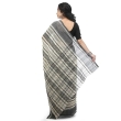 Side view of white and black handmade cotton Dhaniakhali saree showcasing traditional handwoven craftsmanship