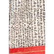 Close-up of handwoven cotton Khes fabric showcasing traditional weave pattern