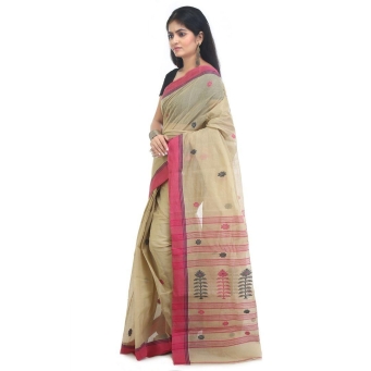 Woman wearing light beige pink contrast handmade Khadi Jamdani saree