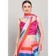 Pink polysilk V-neck blouse paired with saree