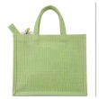 woman carrying green jute handbag daily use