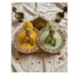 close up yellow green fabric floral embellished texture