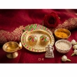compact small size kumkum plate with peacock design