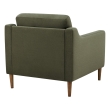 Forest green lounge chair with tufted back and solid wood frame