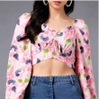 Front view of pink floral chiffon crop top with bell sleeves