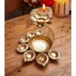 Decorative lotus urli with 7 tealight holders