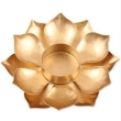 close up golden metal lotus flower candle holder tealight votive stand