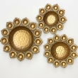 Iron urli bowls used for floating flowers and diya decoration in home