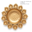 Decorative urli bowls filled with water and flowers for aesthetic floating decor arrangement