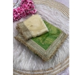 Light green fancy satin saree with sequin butti design and unstitched blouse piece