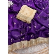 Fancy satin saree paired with an unstitched blouse piece