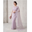 Women's soft net saree with bead embellishments and heavy work blouse