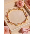 SOLMARE VENTURES zircon gold-plated bracelet worn on wrist