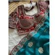Teal satin saree paired with fully stitched blouse
