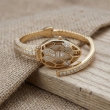 Elegant gold bracelet watch with beautiful crystal detailing