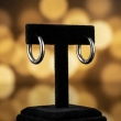 Sleek and stylish huggie hoop earrings