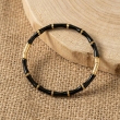 Premium bamboo-style bracelet with sophisticated black onyx detailing