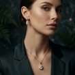 Elegant teardrop pendant necklace set with sparkling earrings for special occasions