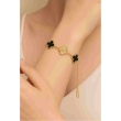 Anti-tarnish black and gold clover bracelet for women with elegant premium finish